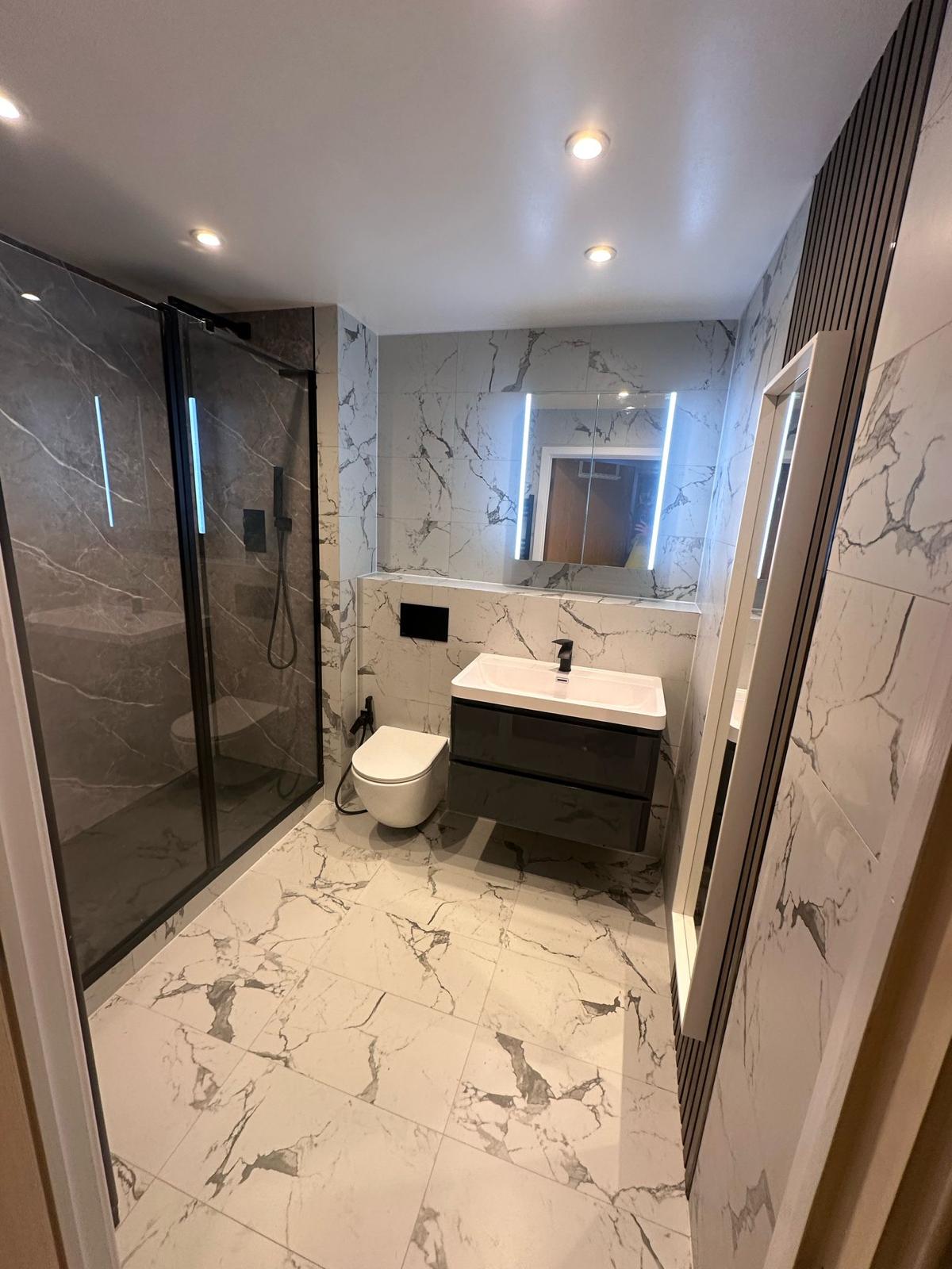 Completed bathroom renovation with premium fixtures